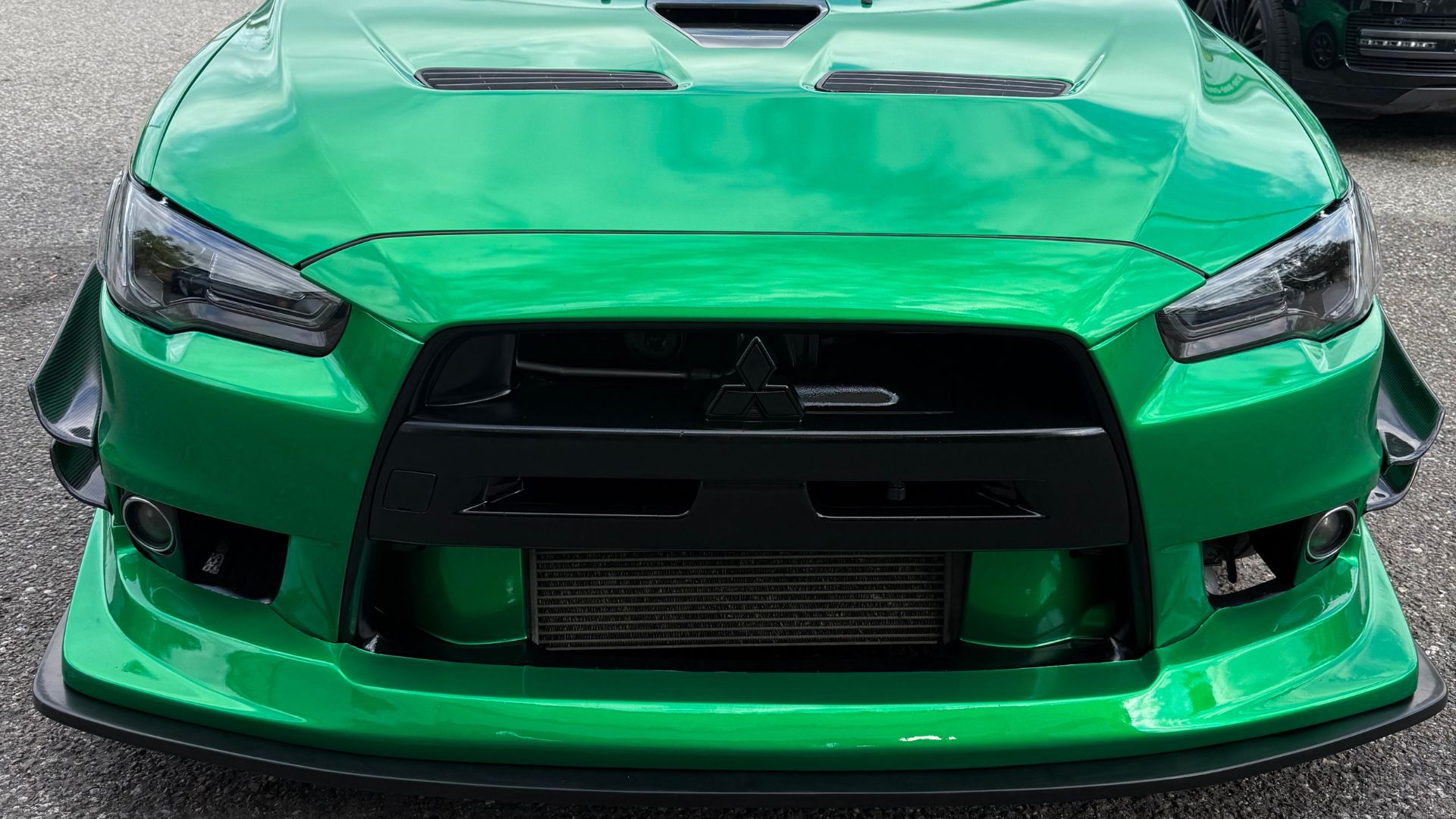 Green solid car , Tampa Auto Wraps