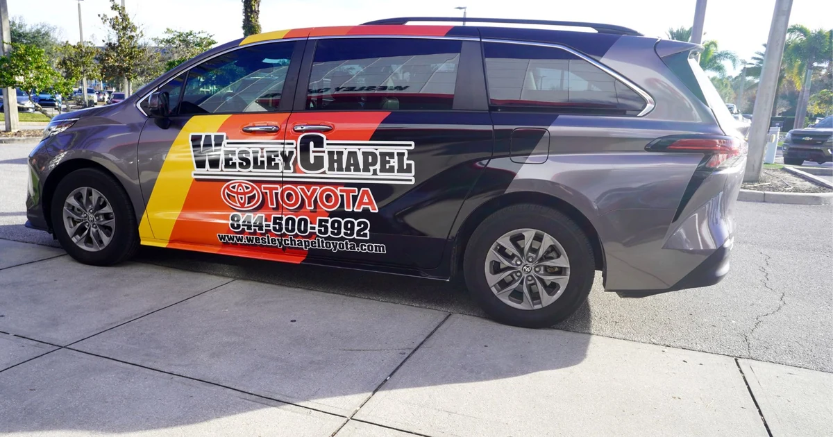 Partial minivan wrap with vinyl lettering in Tampa